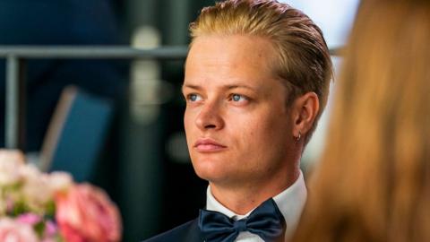 A 2022 image showing a young man with blond hair and a bow tie, Marius Borg Høiby, son of Norwegian Crown Princess Mette-Marit.