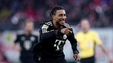 Michael Olise celebrates during Bayern Munich's win at RB Leipzig