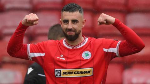 Joe Gormley celebrates scoring for Cliftonville against Glenavon