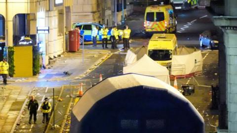 The scene in Water Street near the Liver Building in Liverpool after a 53-year-old white British man was arrested when a car ploughed into a crowd of people during Liverpool FC's Premier League victory parade. Picture date: Monday May 26, 2025.