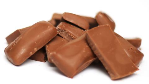 Bars of chocolate in a pile.