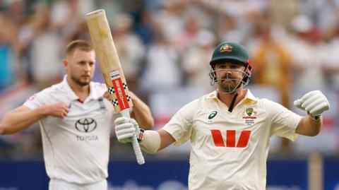 Australia's Travis Head celebrates his century in the first Ashes Test