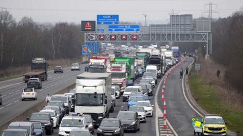 The southbound lanes of the M23 at Gatwick with all lanes full of stopped traffic