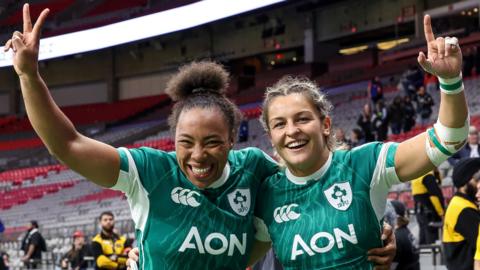 Grace Moore and Erin King celebrate after Ireland's shock win over New Zealand in Vancouver