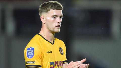 Cameron Evans playing for Newport County against Cheltenham Town in the EFL Cup