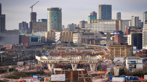 Birmingham skyline showing high-rise buildings. in the foreground is building work as part of the HS2 project