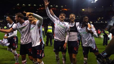 Bolton players celebrate victory over Bradford and their place in the play-off final