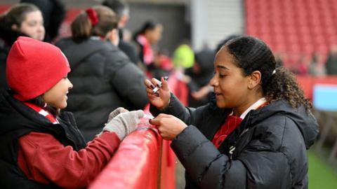 Liverpool's Olivia Smith with fans at the end of the match on Sunday