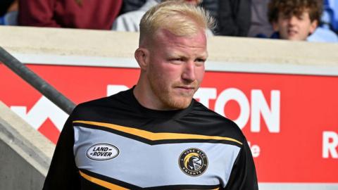 York Knights' on-loan forward Matty English wears a black, white and gold York top at the St Helens game.