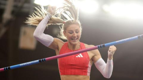 Molly Caudery in pole vault action 