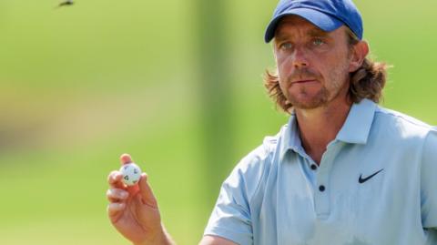 Tommy Fleetwood acknowledging the crowd after holing a birdie putt