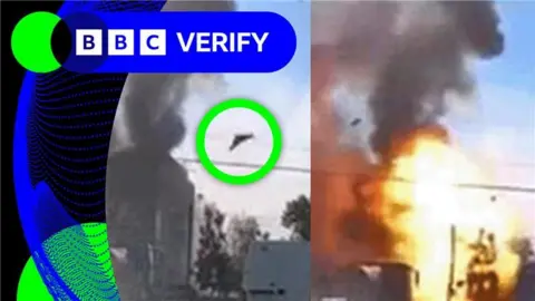 A drone strike against a military building in Ukraine caught on dashcam
