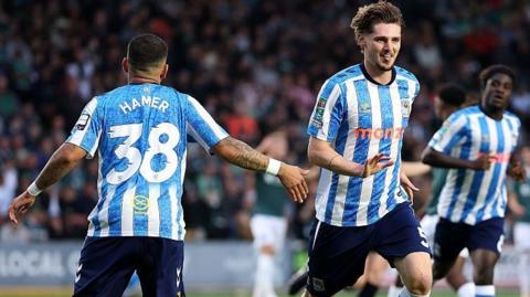 Rudoni celebrates scoring Coventry second goal