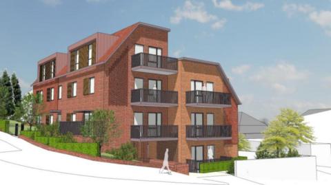 A computer generated image of a new four-storey high housing block at Carden Hill in Hollingbury