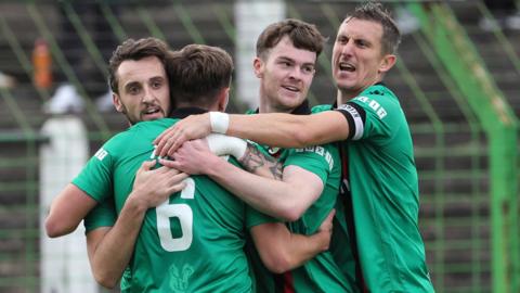Glentoran celebrating their goal