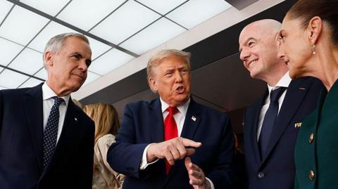 US President Donald Trump, Mexican President Claudia Sheinbaum and Canada's Prime Minister Mark Carney during the trophy presentation at the World Cup