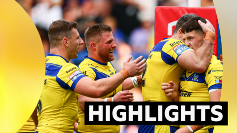 Warrington Wolves' Josh Thewlis celebrates scoring try