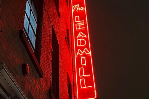 A red luminous fascia sign which reads The Leadmill