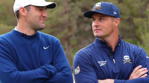 Scottie Scheffler and Bryson DeChambeau looking at each other