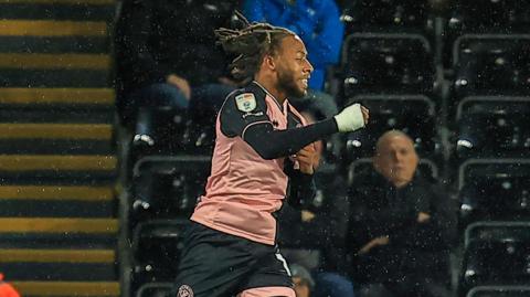 Rumarn Burrell celebrates 