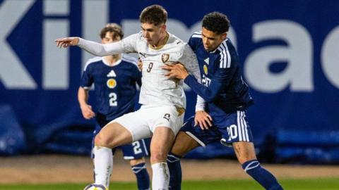 Scotland's Jeremiah Chilokoa-Mullen (R) and Czechia's Matyas Vojta (L) in action during a UEFA U21 Championship Qualification match between Scotland and Czechia at the Scot Foam Stadium at Dens Park, on March 27, 2026,