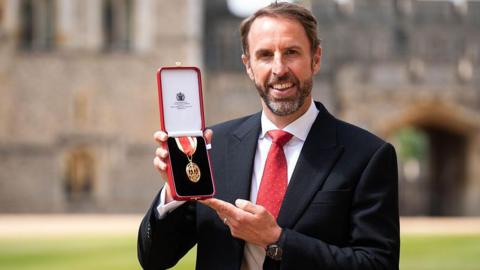 Sir Gareth Southgate poses with his knighthood