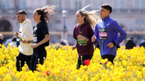 Patrick Dever, Philip Sesemann , Jessica Warner-Judd and Eilish McColgan of Great Britain during the 2026 TCS London Marathon Press Conference 