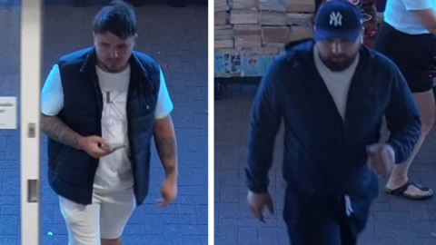 Two separate images side by side of two men walking through the front entrance of a shop captured on a CCTV camera. One man is wearing a white t-shirt and shorts with a black gilet, while the other is in a dark coat wearing a blue cap.  