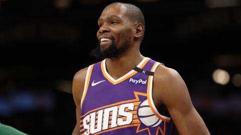 Kevin Durant of the Phoenix Suns smiles