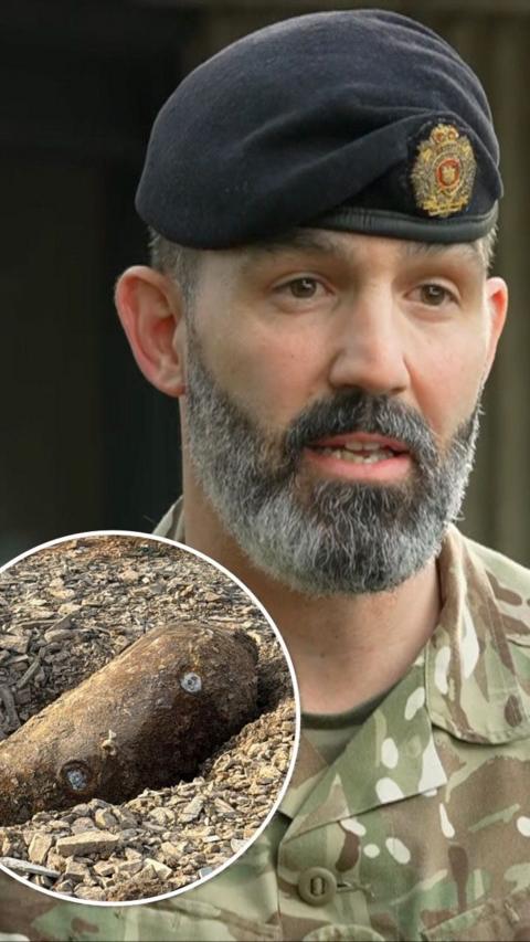 Colonel Nick Handy looking right of camera, with the WW2 bomb inset