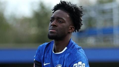 Axel Disasi looks on during under-21 match with Chelsea