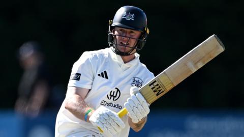 Miles Hammond batting for Gloucestershire.