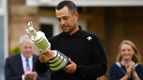 Xander Schaufelle looks at the Claret Jug