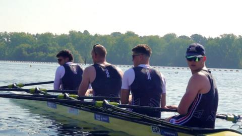 Cedol Dafydd looks towards the camera whilst rowing as part of a training session for Great Britain's quadruple sculls.
