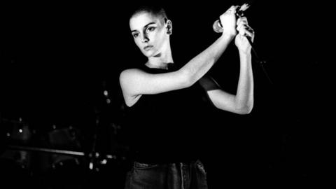 Irish singer Sinead O'Connor performs at Paradiso, Amsterdam, Netherlands, 16 March 1988. (Photo by Paul Bergen/Redferns)