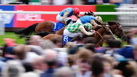Daiquiri Bay battles Hopewell Rock and Opportunity in a sprint finish in the Ebor Handicap at York