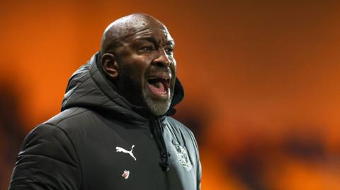Darren Moore shouts at his Port Vale players