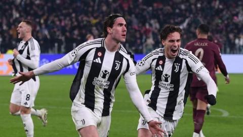 Juventus players celebrate scoring against Manchester City