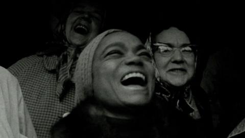 Eartha Kitt laughs with two women from Yorkshire 