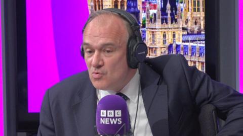 Sir Ed Davey in a studio