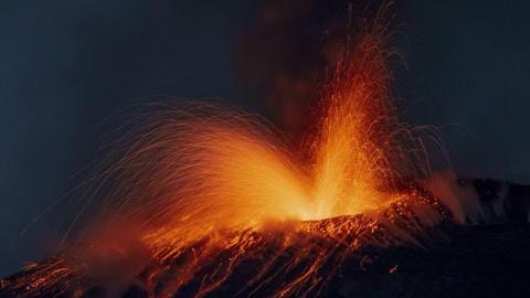 Mount Etna erupting.