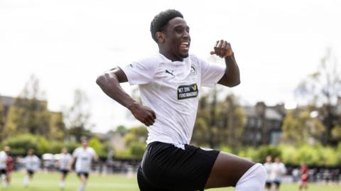 Edinburgh City's Divine Iserhienrhien celebrates