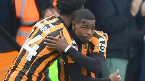 Elliot Matazo celebrates scoring against Stoke City