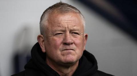 Sheffield United boss Chris Wilder looks on from the touchline.