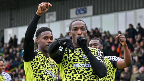 Laurent Mendy celebrates scoring for Forest Green against Brackley