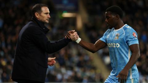Ephron Mason-Clark shakes hands with Frank Lampard