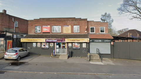 A general view picture of Hillside Stores, a two-storey building with a convenience store located on the first floor.