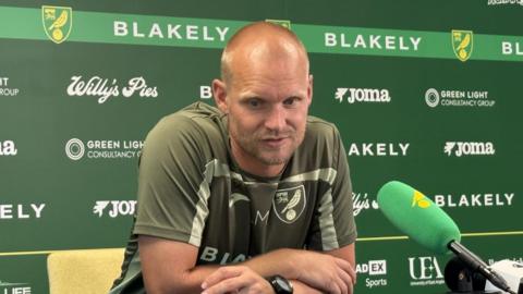 Norwich head coach Liam Manning at a press conference