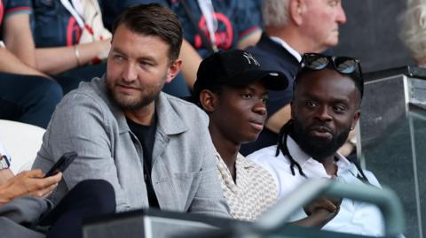 Malick Yalcouye in the stands at the Swansea.com Stadium