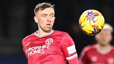 Jordan Shipley stares at the ball as he prepares to control it